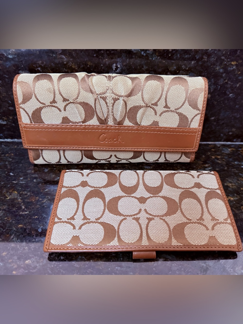 2 piece Coach Brown and Cream Signature Fold-Over Continental Wallet Set.